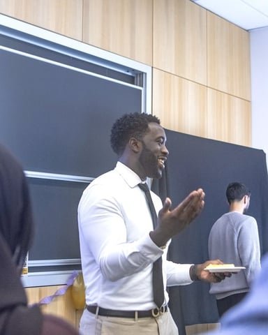 Ezekiel K. Bissah mid-conversation during the Public Speaking in the World of Research workshop