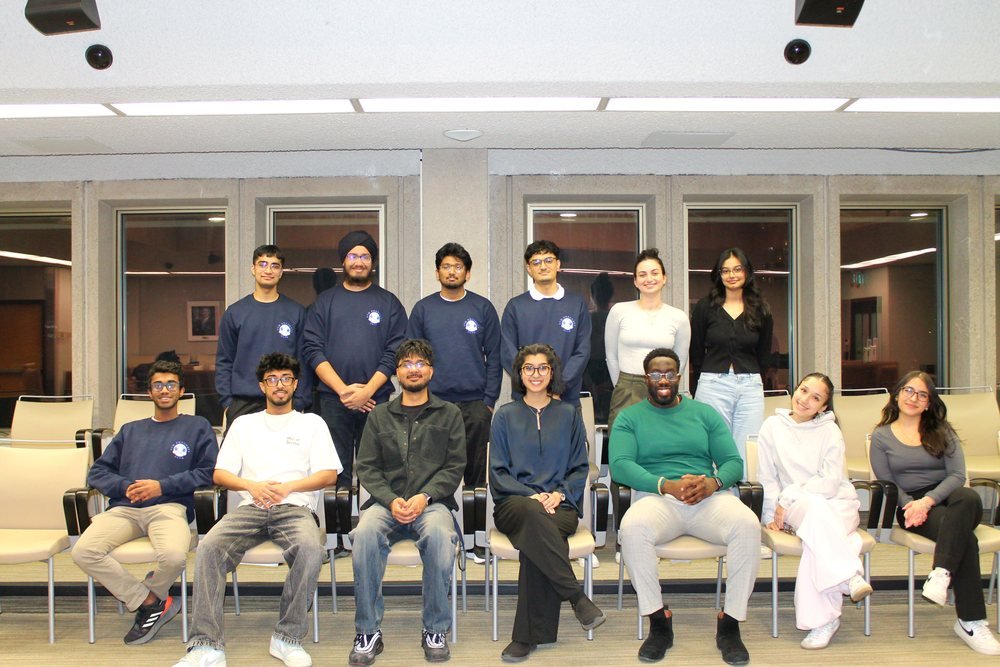 Ezekiel K. Bissah with the UTM-HOSA team and fellow panellists