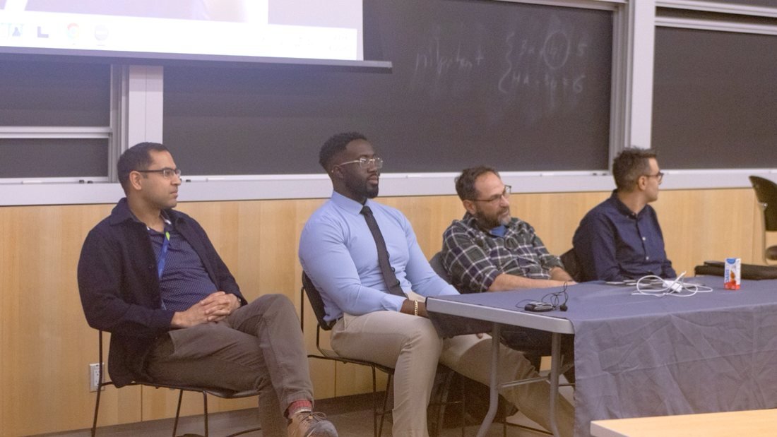 Ezekiel K. Bissah seated on the Let's Talk Research panel alongside other panellists